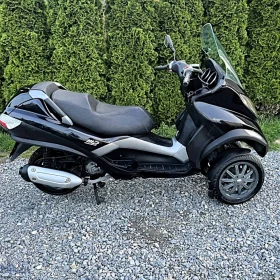 „ Piaggio mp3 - 125 ”. 2007r. Tylko : 45tys.km - Trójkołowy.